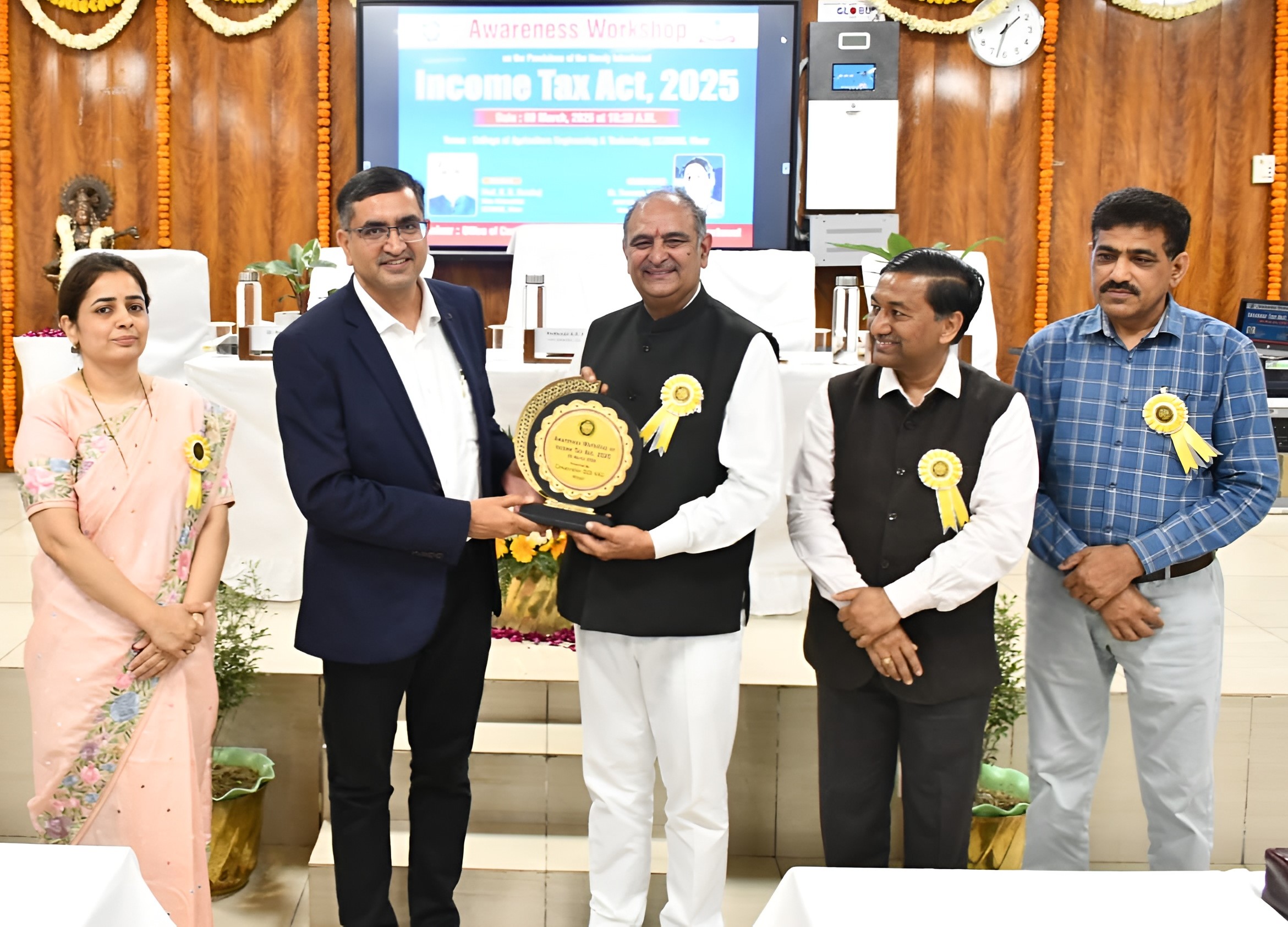 Felicitated by Joint Commissor Income Tax Hisar